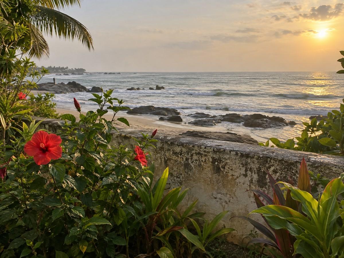 Beachfront garden wall with the grey-green west-coast sea just beyond, 5 pm haze